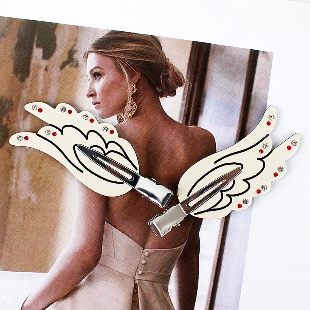 2 pinces à cheveux en cristal  - Women Accessories Online avis et prix