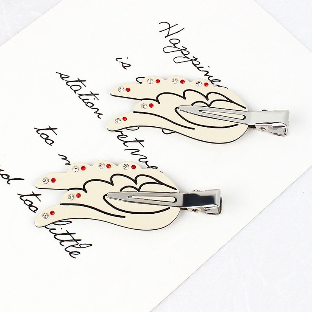 2 pinces à cheveux en cristal  - Women Accessories Online avis et prix